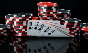 Poker hand and chips