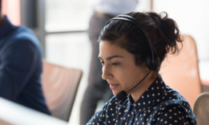 Woman taking call on helpline
