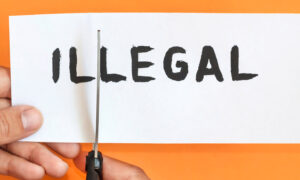 Legal,Concept.,Hand,With,Scissors,Cut,Word,Illegal,To,Make