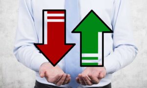 Businessmen,Holding,Two,Arrows,'up',And,'down'