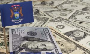 Flag,Of,Michigan,Sticking,In,A,Variety,Of,American,Banknotes.(series)