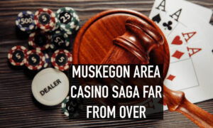 Muskegon area casino saga far from over - gavel with gaming materials