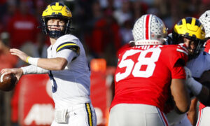 Big Ten Championship Odds - jj mccarthy passing against Ohio State