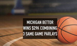 Basketball,On,Court,Floor,Close,Up,With,Blurred,Arena,In
