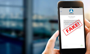 Fake,Text,Message,Sms,Scam,Or,Phishing,Concept.,Man,Hands