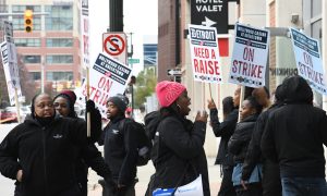 Image of Detroit casino workers on strike for a story providing live updates on the strike