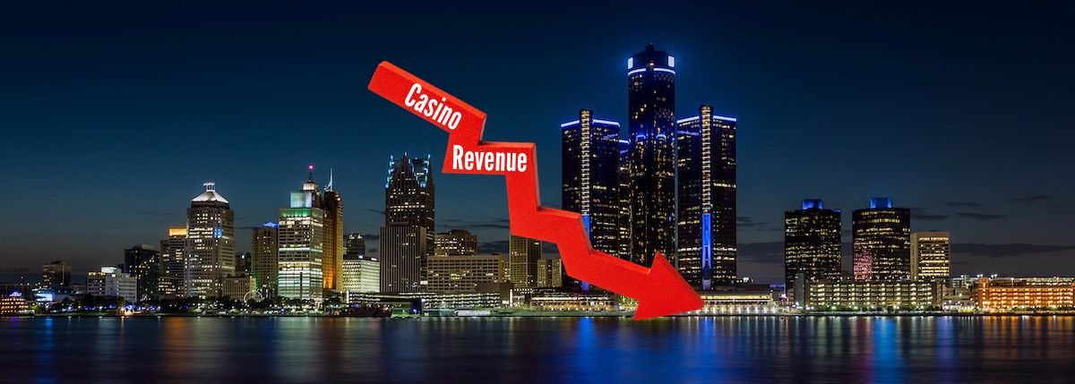 Image of Detroit skyline at night with downward arrow for story on Detroit losing casino revenue during the strike