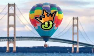 Photo of DraftKings logo on a hot air balloon for story on DraftKings online casino and sportsbook soaring in Michigan in September