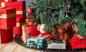 Image of gifts under Christmas tree for story on Gun Lake Casino Offering Free Slots Play In Exchange For Toy Donations