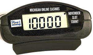 Image of digital reading of 10,000 surrounded by the PlayMichigan logo, November slot count, and Michigan online casinos for a story on how many online slots are live in Michigan in November
