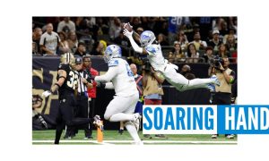Jameson Williams soaring as he scores a touchdown for the Detroit Lions vs. the New Orleans Saints. Leading Michigan online sportsbooks have been soaring during the start of the NFL season.