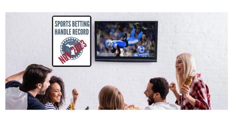 Sports fans watching the Detroit Lions on TV. There is a poster on the wall with a Michigan logo and the words "Sports Betting Handle Record" to signify Michigan setting a record in November 2023.