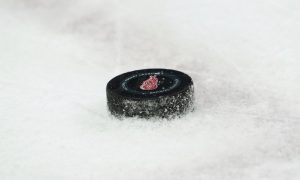 Puck with logo for Detroit Red Wings, which will be the theme of a new Play'n GO game coming to PokerStars Casino in Michigan