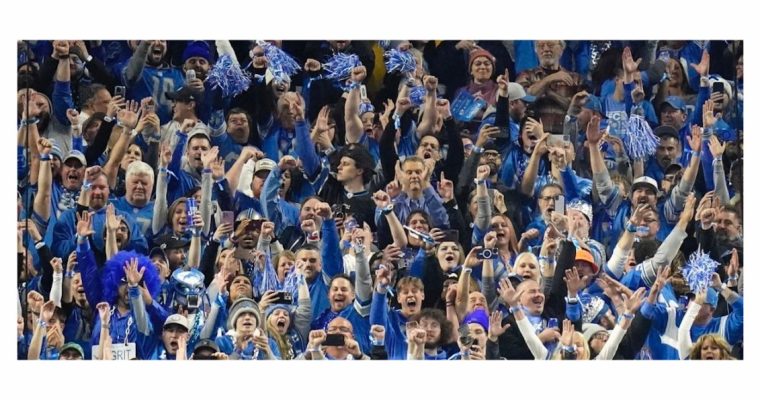 Detroit Lions fans celebrating. Michigan online sports betting set record in December and for 2023