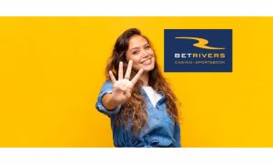 Woman holding up four fingers beside a logo for BetRivers casino and sportsbook to indicate four new slots games added by BetRivers Michigan
