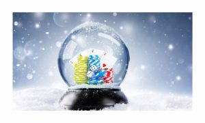 Snow globe on a bed of snow. Inside the snow globe is a stack of casino chips, some playing cards and a pair of dice to indicate it is cold outside as part of the list of January promotions for Michigan casinos