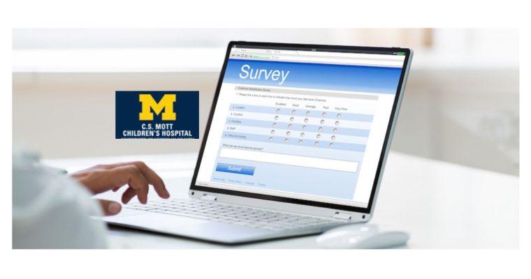 Person filing out an online survey on a laptop. There is a University of Michigan C.S. Mott Children's Hospital logo on the wall. A hospital study on teenagers and gambling reveals a gap in knowledge among parents