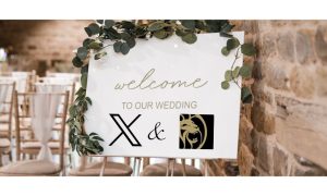 Sign at the entrance to a banquet hall that says "Welcome to our Wedding" with the logos of X and BetMGM underneath to indicate a deal between the gambling operator to be featured on the social media platform