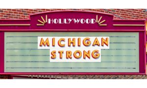 Marquee with a Hollywood logo and the words "Michigan Strong" on the now playing section of the sign. PENN Entertainment is hoping to make its way to 7% market share for Michigan online casino revenue. Can Hollywood Casino get there?