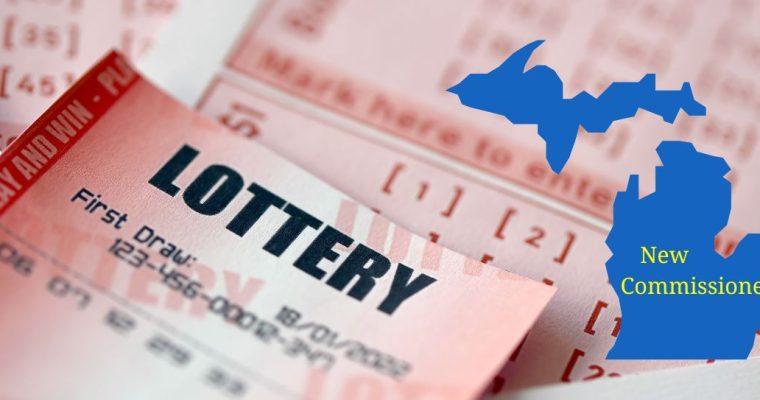 A stack of lottery tickets with a map of Michigan over the top and the words "New Commissioner" on the map of Michigan