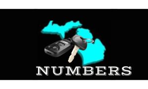 A large set of car keys and the word "Numbers" over a blue 3D outline of the state of Michigan on a black background. to indicate the 5 most important online casino numbers in Michigan.