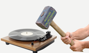 Man holding a large sledgehammer with the words "Michigan online casinos" on it is about to smash a vinyl records to signify the fact that Michigan's online casinos set another new revenue record in February, collecting $188 million last month to top the previous mark by nearly $6 million.