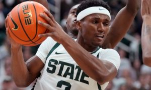 Michigan State guard Tyson Walker looks to pass during the second half of an NCAA college basketball game against Georgia Southern, Tuesday, Nov. 28, 2023, in East Lansing, Mich. Unlike Ohio, College Prop Bets Are Legal In MI For March Madness.