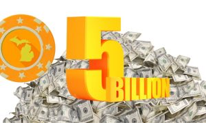 Large orange and yellow poker chip with the Michigan outline on it, a large pile of money and the large yellow and orange words "5 BILLION." How Michigan became the third state to cross the $5 billion threshold and is the second-largest market despite launching after NJ and PA.