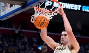 Zach Edey dunks during the second half of a Sweet 16 college basketball game against Gonzaga in the NCAA Tournament, Friday, March 29, 2024, in Detroit. Michigan recorded the best month of March in its history because of the NCAA Tournament and playing host to Sweet 16 and Elite 8 games.