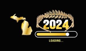 Michigan outline in gold next to a logo saying 2024 "loading" and a golden laurel wreath. Caesars officials confirmed during its Q1 earnings call that newly-acquired WynnBet brand would launch in Michigan under a new name in 2024.