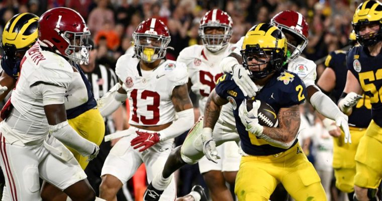 University of Michigan football player Blake Corum runs for a touchdown against Alabama in the 2024 Rose Bowl. The discussion on rules, regulations, and compliance comes as the MGCB considers bans on prop bets on college sports.