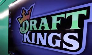 DraftKings logo at DraftKings headquarters. DraftKings Tops $1 Billion In Lifetime iGaming Revenue Despite Shrinking Share