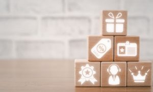 Loyalty rewards concept. Because of strong customer retention and feedback, Rush Street Interactive revamped and enhanced the BetRivers loyalty program in Michigan.