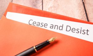 Image of a cease and desist letter for a story on the MGCB ordering an unregulated online lottery company to halt its business operations in Michigan.