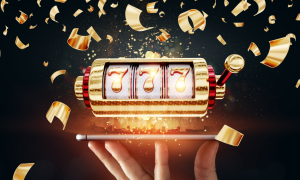 an image of a winning slot being held in a hand