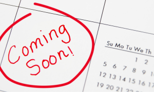 a calendar with a coming soon circled in red on it