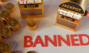 a banned sign in the middle of mini slot machines