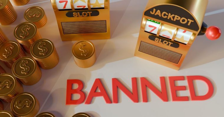 a banned sign in the middle of mini slot machines