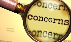 a magnifying glass over the word concern