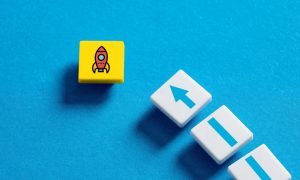 a tile of a rocket with a series of tiles forming an arrow behind it