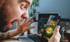 a DraftKings casino customer hit a record $22.4 million iGaming progressive jackpot.
