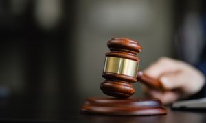 Judge Aquilina ordered Kalshi to halt Michigan sports wagering immediately, citing harm to minors and a $120K daily fine for noncompliance.