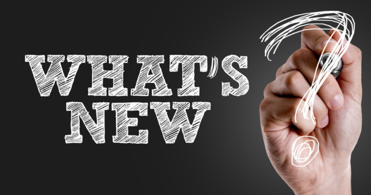 What's New? written on glass panel