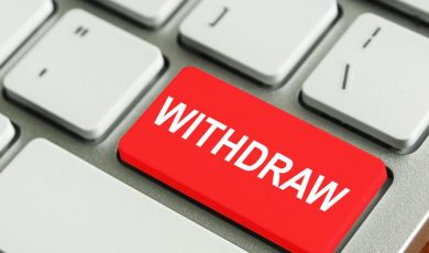 Red withdraw key on a computer keyboard