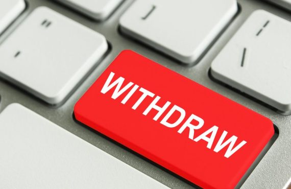 Red withdraw key on a computer keyboard