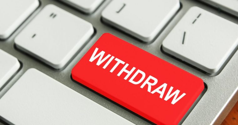 Red withdraw key on a computer keyboard