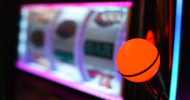 Michigan regulators seized illegal slot machines and cash at a Muskegon bar.