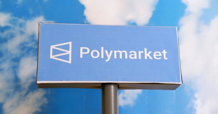 Detroit is inspecting a Polymarket logo painted on a water tower near I-94